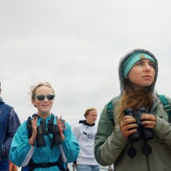 Members of the 2024 Youth Action Council engaged in a hands-on experiences, learning about marine mammal conservation and the critical role they play in protecting our oceans.